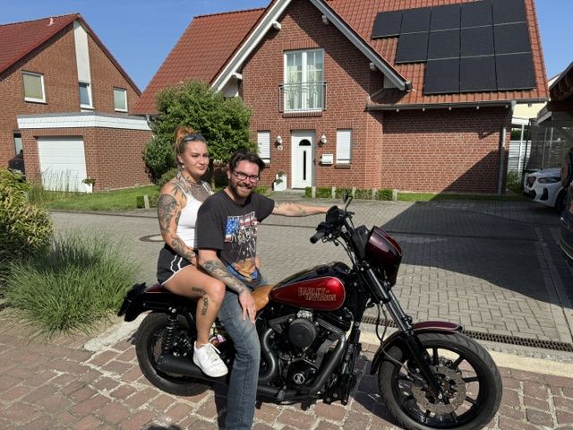 Rider and passenger on a Harley-Davidson