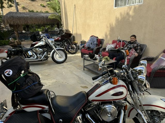 Motorcycles parked on a patio at the end of the trip near Los Angeles